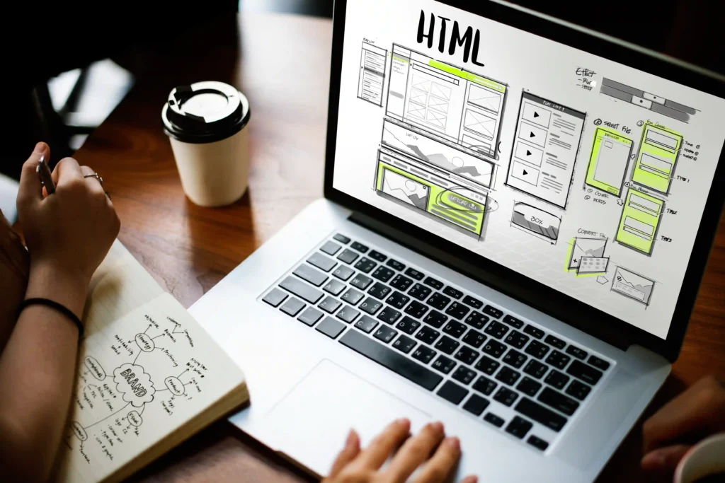 Best website builder for beginners image illustrating designing a webpage with HTML.