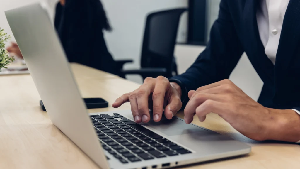 ChatGPT tutorial, image depicting a man using a laptop